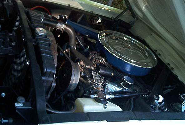 Close-up engine bay, blue accents