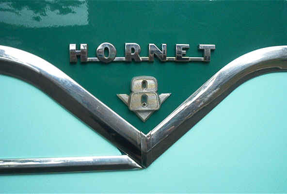 Hudson Hornet V8 badge close-up